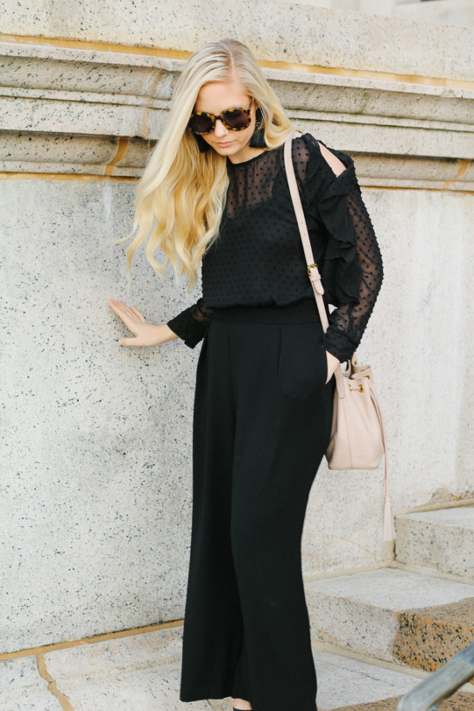 Dressed up in a black cold shoulder jumpsuit from Zara