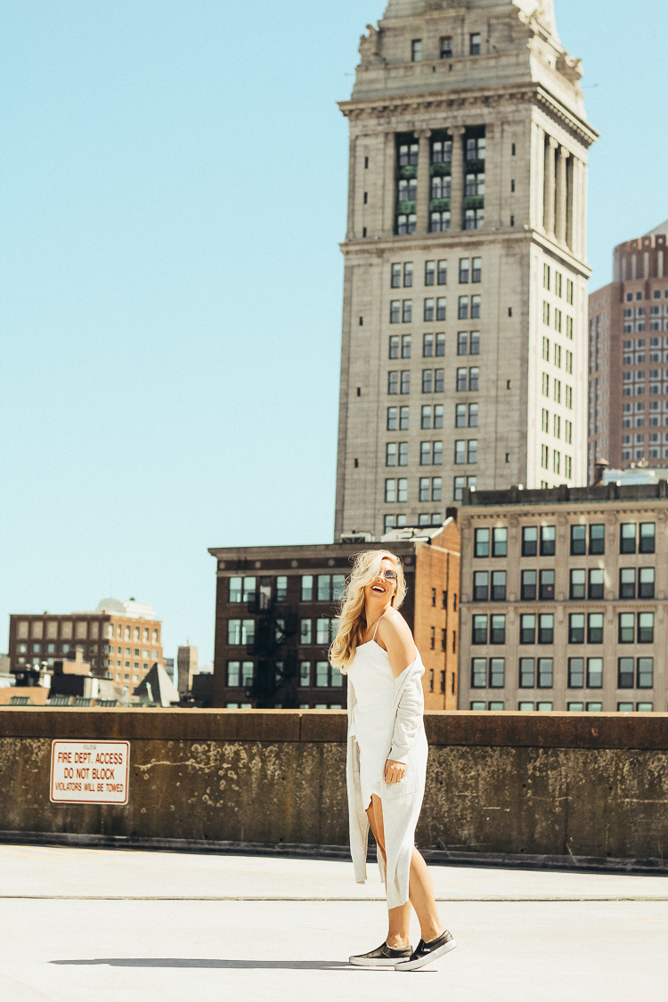 spring outfit in boston | best views of boston | where to go for the best views in Boston | Princess Polly Boutique Dress | White wrap dress for spring | dress with sneakers | parking garage views in Boston | why you should do those things that scare you | do all of the things that scare you | princess polly dresses | 