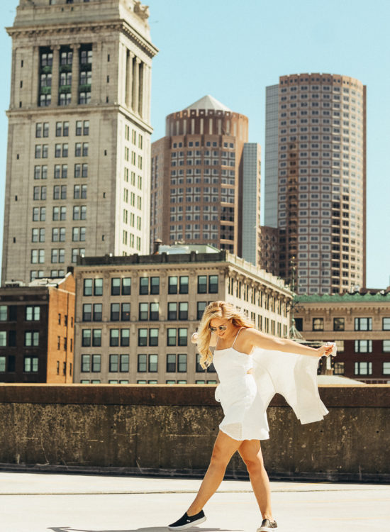 spring outfit in boston | best views of boston | where to go for the best views in Boston | Princess Polly Boutique Dress | White wrap dress for spring | dress with sneakers | parking garage views in Boston | why you should do those things that scare you | do all of the things that scare you | princess polly dresses |