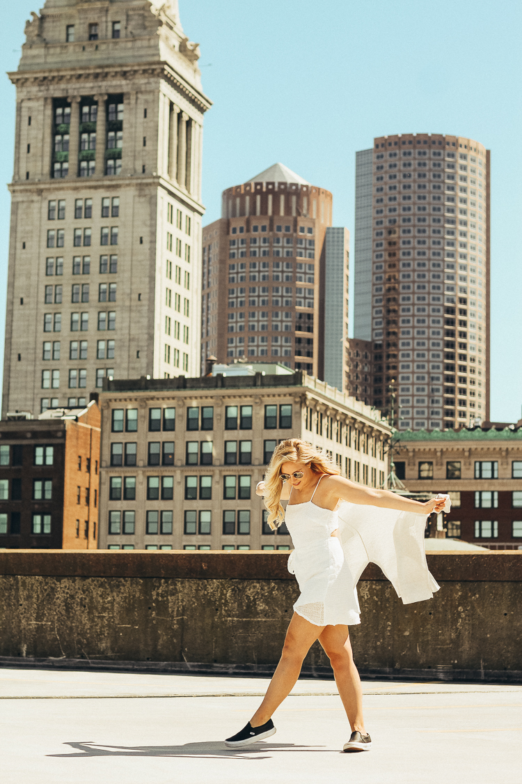 spring outfit in boston | best views of boston | where to go for the best views in Boston | Princess Polly Boutique Dress | White wrap dress for spring | dress with sneakers | parking garage views in Boston | why you should do those things that scare you | do all of the things that scare you | princess polly dresses | 